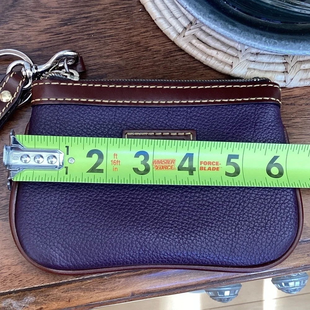 Dooney & Bourke pebbled deep purple and Brown Leather Wristlet, keychain